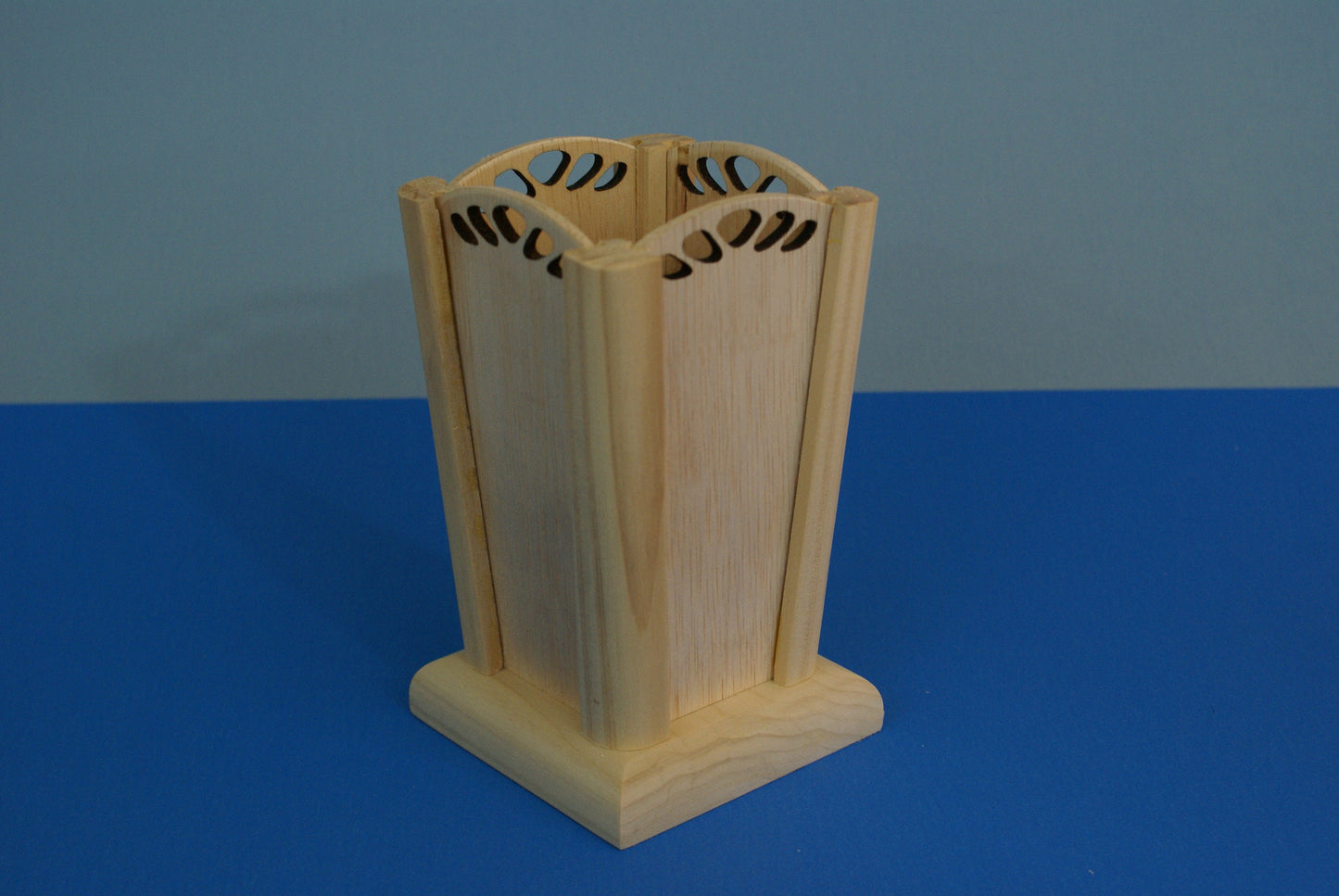 Wood vase with decorative laser cut out