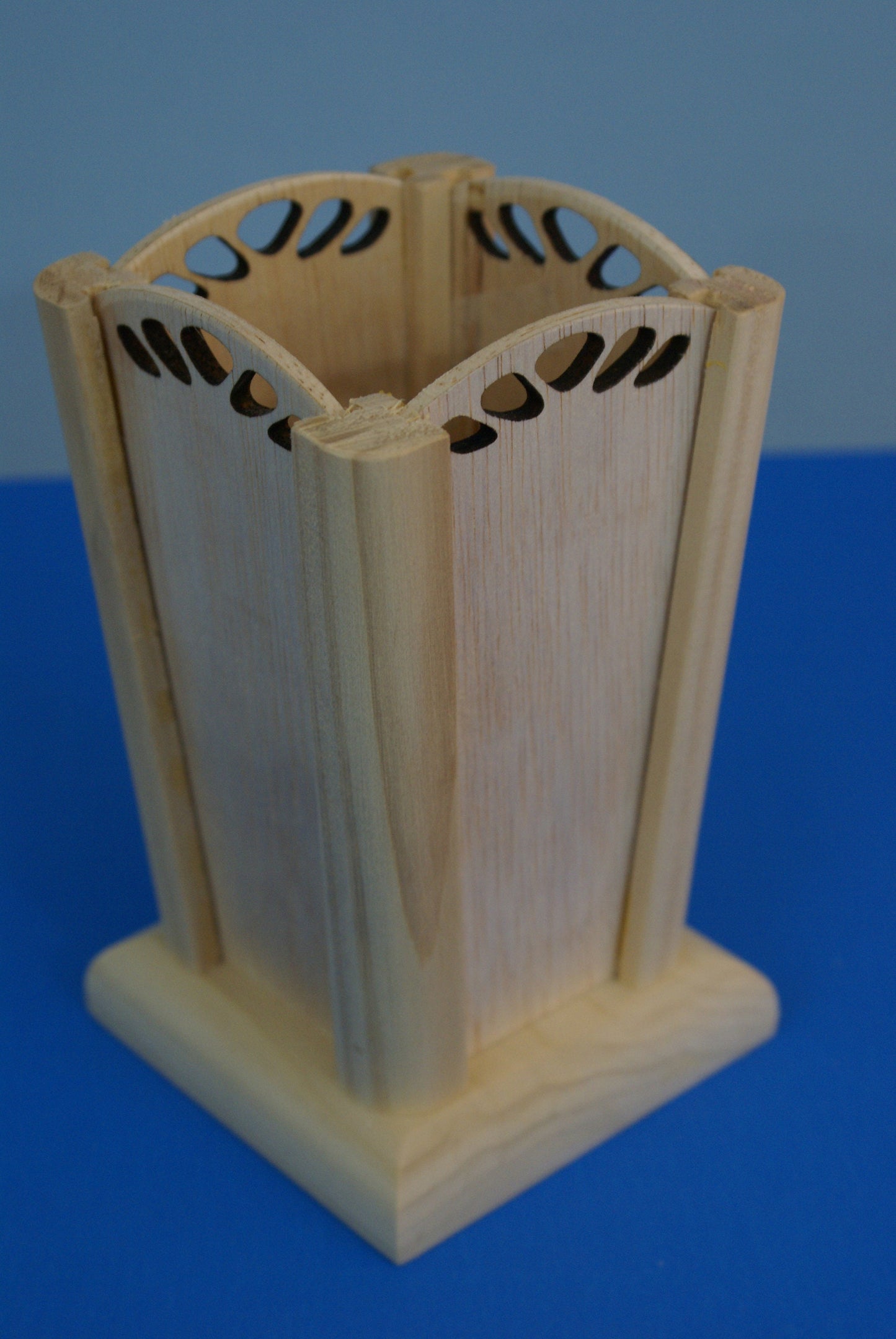 Wood vase with decorative laser cut out