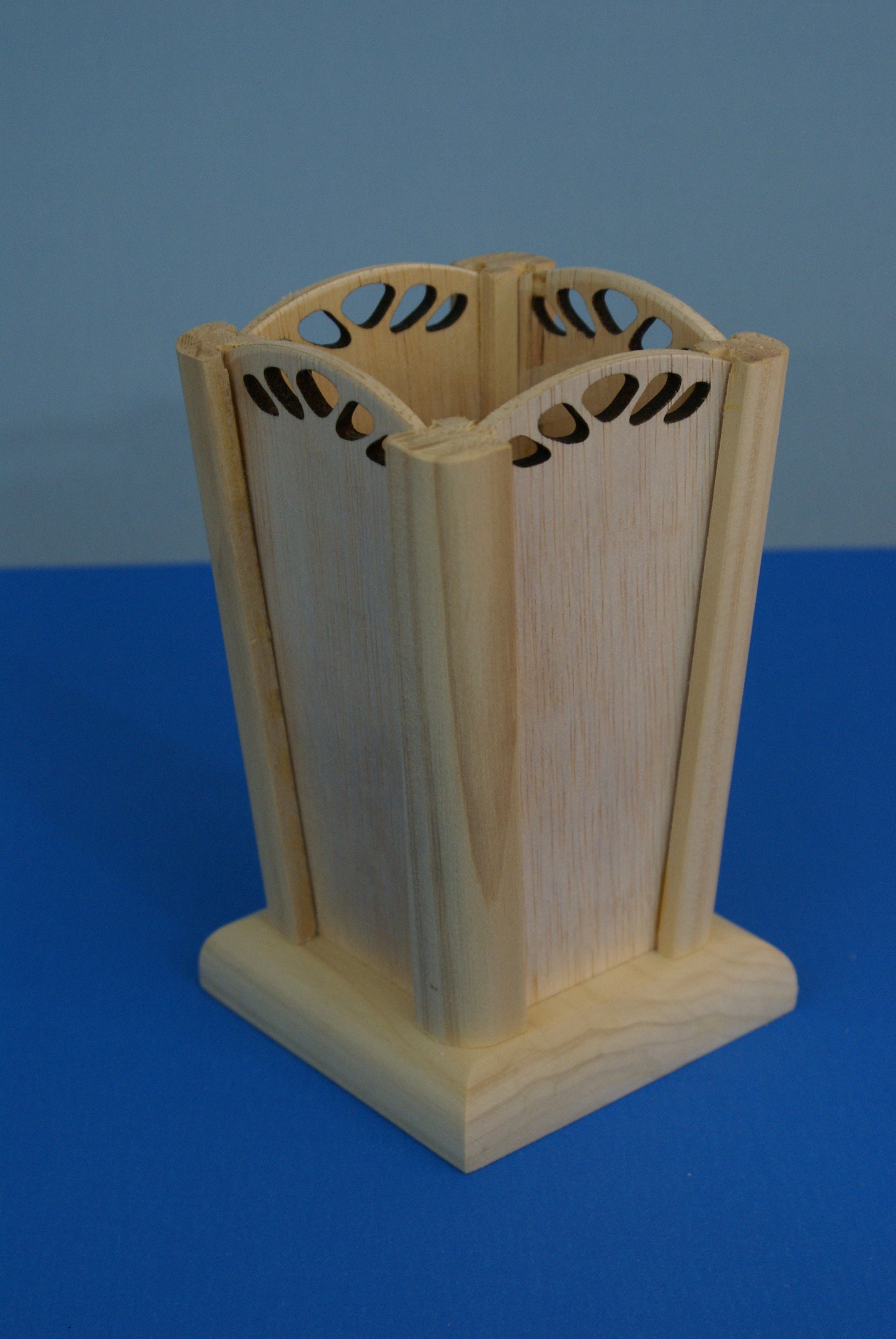 Wood vase with decorative laser cut out