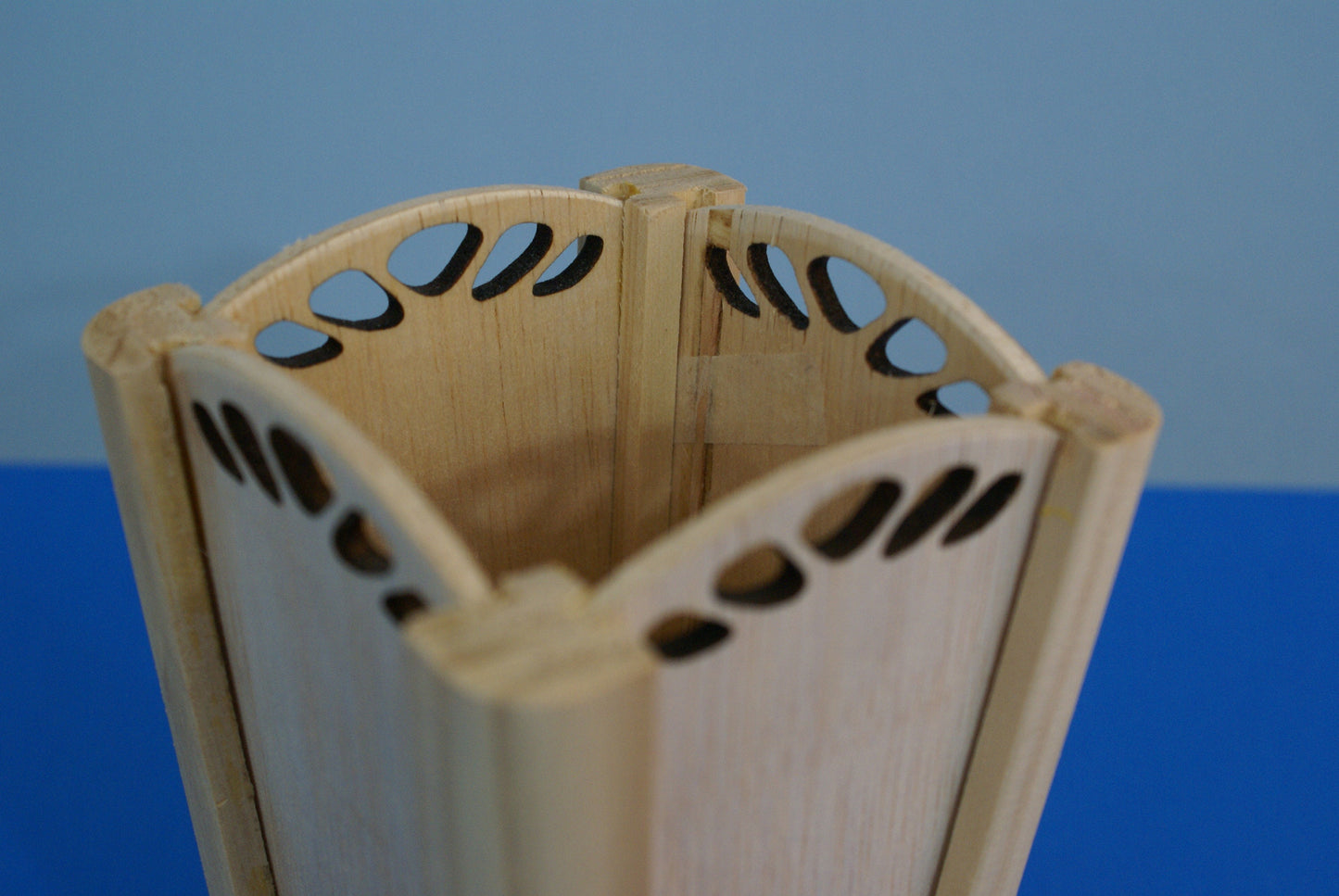 Wood vase with decorative laser cut out