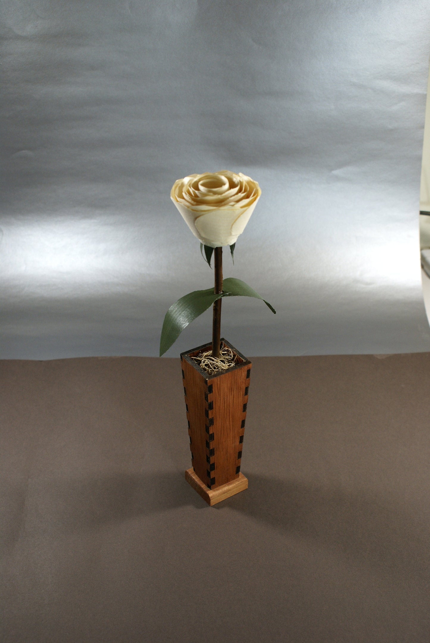 Wood rose and wooden vase