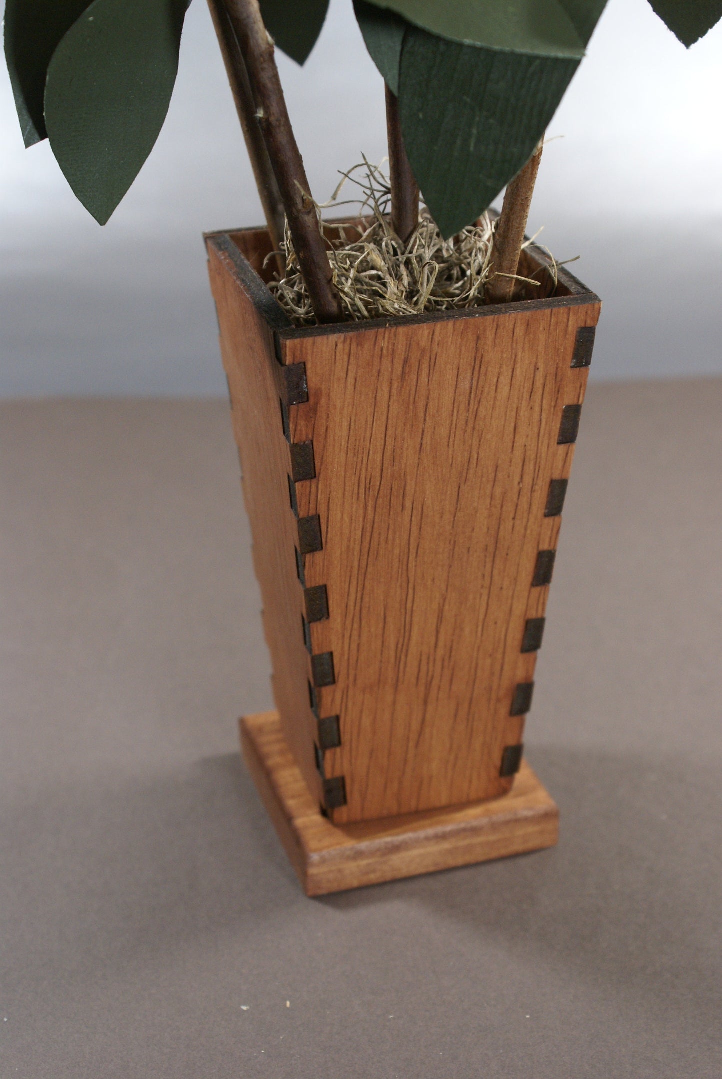 5 Wooden roses in wood vase