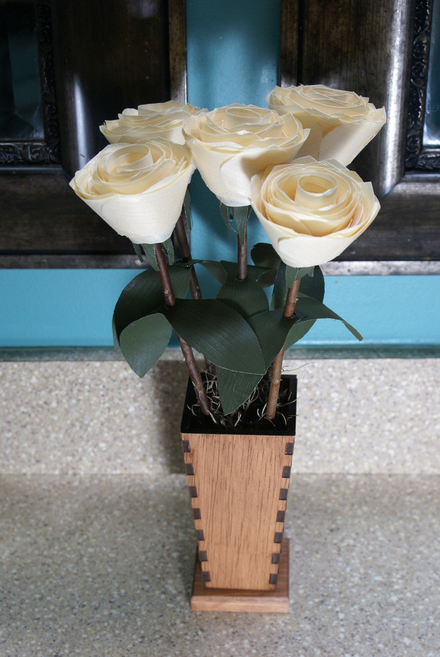 5 Wooden roses in wood vase