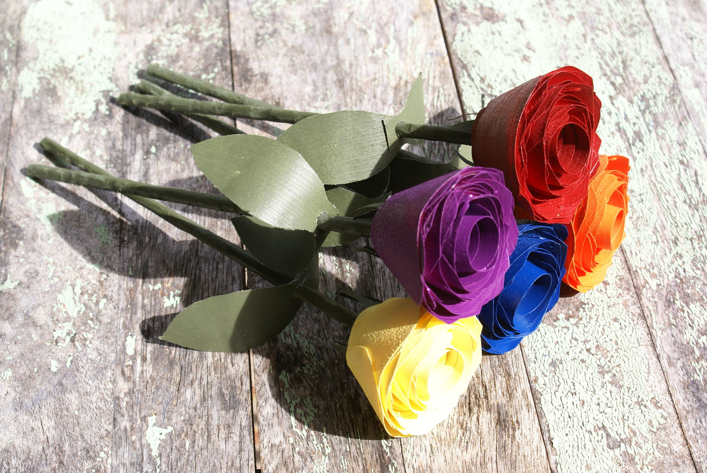 5 Rainbow color wood roses, Red, orange yellow blue and purple on green stems