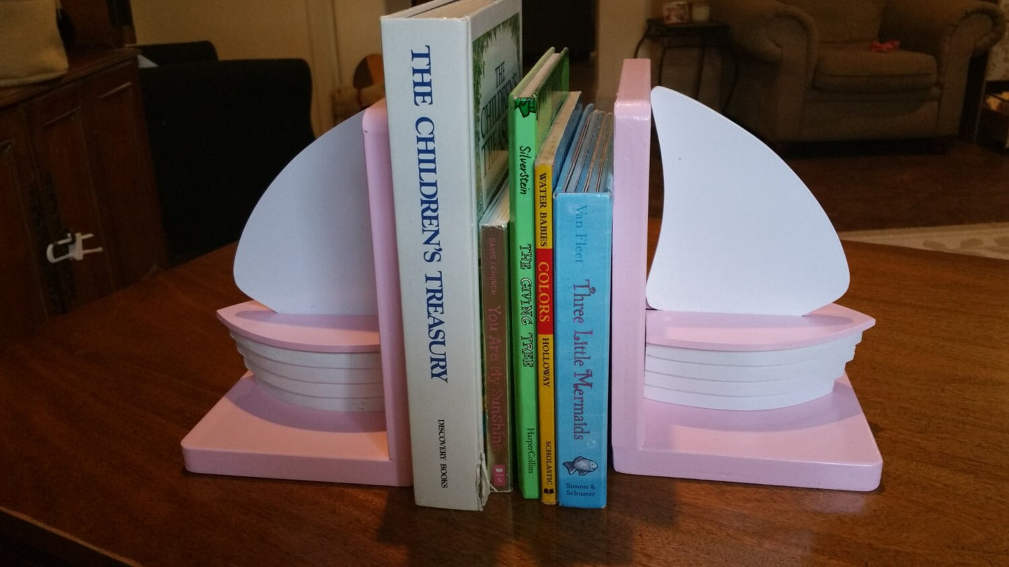 Pink and white wood sailboat bookends for nautical nursery